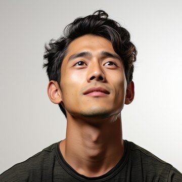 dreamy malaysian man gazing upwards 1308 152903